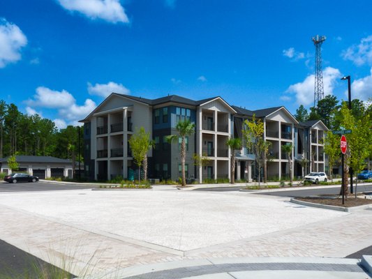 Woodfield Carnes Crossroads 3 - Maka Painters was entrusted with the complete interior and exterior painting of Woodfield Carnes Crossroads 3, a luxury multi-family community in Summerville, SC. Our work spanned every building, the clubhouse, garages, and all amenity spaces—transforming the property inside and out.
Exterior:
We applied premium, weather-resistant coatings to all façades, trim, railings, and architectural accents, delivering a sharp, modern palette that enhances curb appeal and protects against the South Carolina climate.
Interior:
From model units to corridors, amenity rooms, and leasing offices, we delivered flawless wall, ceiling, and trim finishes—ensuring durability in high-traffic areas while creating a warm, inviting atmosphere for residents.
Every brushstroke was guided by precision, efficiency, and attention to detail, resulting in a cohesive, upscale look that reflects the quality of the development and elevates the resident experience. Woodfield Carnes Crossroads 3 - Maka Painters was entrusted with the complete interior and exterior painting of Woodfield Carnes Crossroads 3, a luxury multi-family community in Summerville, SC. Our work spanned every building, the clubhouse, garages, and all amenity spaces—transforming the property inside and out.
Exterior:
We applied premium, weather-resistant coatings to all façades, trim, railings, and architectural accents, delivering a sharp, modern palette that enhances curb appeal and protects against the South Carolina climate.
Interior:
From model units to corridors, amenity rooms, and leasing offices, we delivered flawless wall, ceiling, and trim finishes—ensuring durability in high-traffic areas while creating a warm, inviting atmosphere for residents.
Every brushstroke was guided by precision, efficiency, and attention to detail, resulting in a cohesive, upscale look that reflects the quality of the development and elevates the resident experience.
