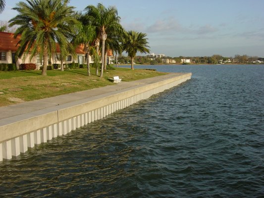 Concrete Cap Seawall - This is a seawall constructed with vinyl panels and a concrete cap. Concrete Cap Seawall - This is a seawall constructed with vinyl panels and a concrete cap.