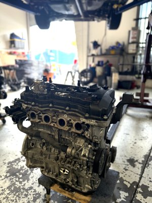 Hyundai Engine Replacement - We recently replaced the engine on this Hyundai Sonata due to severe oil starvation. The original engine was beyond repair, so we installed a low-mileage replacement at a great value for the customer. The full project took just 5 days and included a complete turbo rebuild as well. Fortunately, our neighbors at Pure Turbos—experts in turbocharger rebuilds—handled that portion with precision. Teamwork and experience made this a smooth, successful job, and the customer couldn’t be happier with the results. Hyundai Engine Replacement - We recently replaced the engine on this Hyundai Sonata due to severe oil starvation. The original engine was beyond repair, so we installed a low-mileage replacement at a great value for the customer. The full project took just 5 days and included a complete turbo rebuild as well. Fortunately, our neighbors at Pure Turbos—experts in turbocharger rebuilds—handled that portion with precision. Teamwork and experience made this a smooth, successful job, and the customer couldn’t be happier with the results.