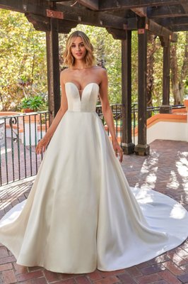 Jasmine Bridal Collection - This Magic Moment Bridal Studio is a unique bridal experience where family and friends can help you find the wedding dress of your dreams. Our expert stylists are here to help you say “Yes!” to the dress, and make sure that you feel confident in your selection. We have a large and diverse selection of wedding dresses, so you’re sure to find something that fits your style and budget. Visit us today and let’s start celebrating this magic moment! With over 7 unique and beautiful lines, our prices range from $1300 to $4000. A perfect spot in-between the national average of $1900 published by The Knot. We are rated #1 in Pittsburgh by brides on both our reviews and voted winner of 2022 & 2023 Best Of The 'Burgh. We are also and Best of Weddings by The Knot for 2023, yet again! We highly recommend you take a look at our reviews and get a great feel for our beautiful studio. A hot tip, it's best to come shop 12 to 15 months prior to the wedding date. It gives the perfect time to get your beautiful dress made, delivered, and ready for alterations. Let everything come together stress-free and with ease. Book the best bridal experience because you deserve it.