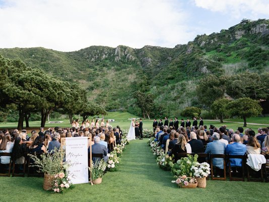 Weddings at The Ranch in Laguna - The Ranch at Laguna Beach offers stunning coastal-canyon setting and a seamless blend of nature and refined architecture. From ceremony arches on the Harvest Lawn soaring above the fairway to elegant centerpieces in the Sage Ballroom’s glass-walled grandeur, we collaborate with you to enhance every corner in a venue we know, trust, and absolutely love.
Photography Credit:
Wild Whim Photography
Gregory Ross Photography Weddings at The Ranch in Laguna - The Ranch at Laguna Beach offers stunning coastal-canyon setting and a seamless blend of nature and refined architecture. From ceremony arches on the Harvest Lawn soaring above the fairway to elegant centerpieces in the Sage Ballroom’s glass-walled grandeur, we collaborate with you to enhance every corner in a venue we know, trust, and absolutely love.
Photography Credit:
Wild Whim Photography
Gregory Ross Photography
