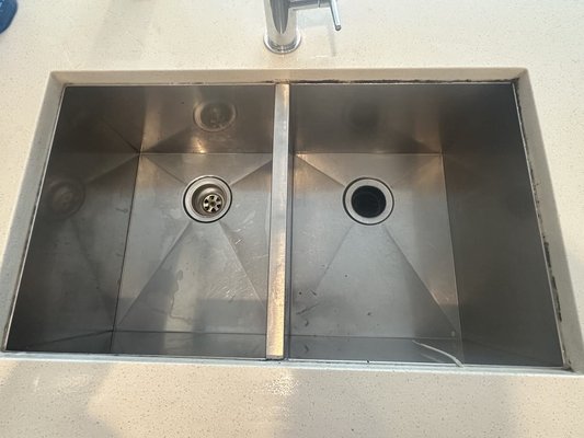Caulking Refresh! - Job well done!  We've successfully removed the old caulking and re-applied new caulking to this sink, ensuring a fresh and watertight seal that will last for years to come.  From big projects to small, our team is dedicated to delivering top-notch results that stand the test of time!