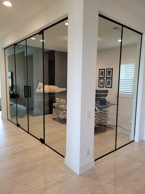 Palmdale Office Partition - The homeowner for this New Construction Home in Palmdale, CA decided that the off-kitchen Formal Dining area would better serve as his In-Home Office. We helped design a contemporary glass wall-partition with a set of double doors that helped transform the space into an eye-popping and functional space. Palmdale Office Partition - The homeowner for this New Construction Home in Palmdale, CA decided that the off-kitchen Formal Dining area would better serve as his In-Home Office. We helped design a contemporary glass wall-partition with a set of double doors that helped transform the space into an eye-popping and functional space.