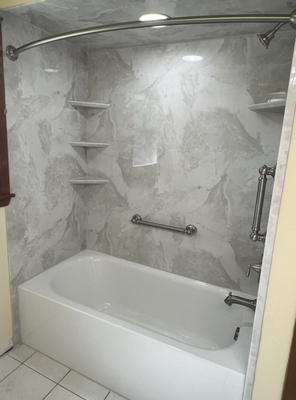 Bathtub Upgrade - This project involved the complete transformation of a vintage bathroom featuring a 75-year-old original cast iron tub and tile. The goal was to upgrade the space with a luxurious new soaker tub, complemented by sleek acrylic walls and stylish nickel finishes. Bathtub Upgrade - This project involved the complete transformation of a vintage bathroom featuring a 75-year-old original cast iron tub and tile. The goal was to upgrade the space with a luxurious new soaker tub, complemented by sleek acrylic walls and stylish nickel finishes.
