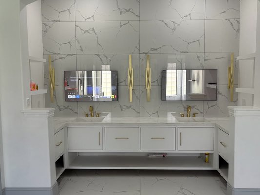 Transform Your Master Bathroom Into a Luxury Retreat - Transform Your Master Bathroom Into Your Own Private Retreat.
Create a timeless, luxury design with a spacious walk-in shower, custom vanity, designer tile, LED lighting, a smart TV mirror, built in Bluetooth speakers, and premium finishes. Every detail is designed to bring comfort, relaxation, and a spa like experience so your bathroom feels like your own personal heaven every single day.