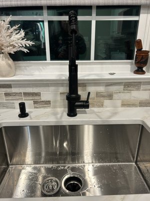 Kitchen Faucet & Garbage Disposal - This kitchen faucet was installed by our apprentice, Jaiden. Great attention to detail and beautiful results! Kitchen Faucet & Garbage Disposal - This kitchen faucet was installed by our apprentice, Jaiden. Great attention to detail and beautiful results!