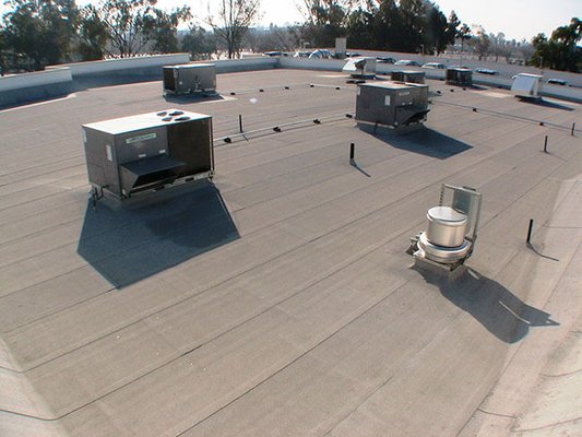 Commercial SA Cap sheet / Self-Adhering Cap Sheet - To show you the difference we make on roofing systems throughout the San Jose and SF Bay Area, we have compiled an SA Cap sheet / Self-Adhering Cap Sheet gallery. This gallery includes photos of roofs before and after we have applied CertainTeed Flintlastic Self Adhering roofing products. These products are beneficial for both commercial roofs and industrial roofs.

CertainTeed Flintlastic® SA roofing membranes are high-quality commercial and industrial roofing materials that meet the requirements for Energy Star, California Title 24, and CertainTeed’s standards for use on low-sloping roofs. If you would like to know more about these products, we encourage you to browse through our SA Cap sheet / Self-Adhering Cap Sheet gallery: