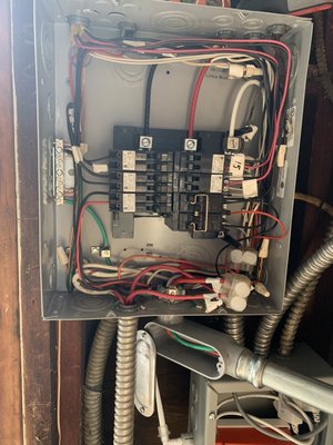 Sub panel replacement - We installed a new sub panel at garage, old conduit and sense system installed
