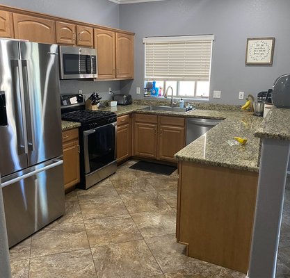Kitchen Remodel - Remodeling an old kitchen by replacing the sink, painting and getting a new oven installed and fridge installed. Kitchen Remodel - Remodeling an old kitchen by replacing the sink, painting and getting a new oven installed and fridge installed.