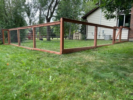 Wood & Wire Fence Styles - This style combines natural wood framing with galvanized or black welded wire panels, creating a light, open design that keeps pets safe while maintaining clear views of your property. It’s a popular choice for acreage properties, gardens, and modern Colorado homes looking for both function and simplicity.

Contact us for a free quote — we’ll help you design the perfect balance of openness, safety, and style.