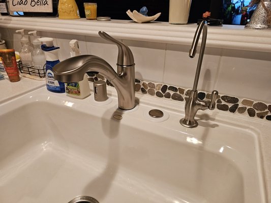 Sink remodeling project - This was a great ending. Originally the client was wanting to replace the entire sink because of the disrepair that it seemed to be in. But instead of having to go through the extra hassle and expense of replacing the entire sink, I was able to redo their plumbing fixtures and clean up the old sink to look like new. The client was super happy with the end result and liked their old sink even more than current available options and was thankful I helped them love their kitchen again. Sink remodeling project - This was a great ending. Originally the client was wanting to replace the entire sink because of the disrepair that it seemed to be in. But instead of having to go through the extra hassle and expense of replacing the entire sink, I was able to redo their plumbing fixtures and clean up the old sink to look like new. The client was super happy with the end result and liked their old sink even more than current available options and was thankful I helped them love their kitchen again.