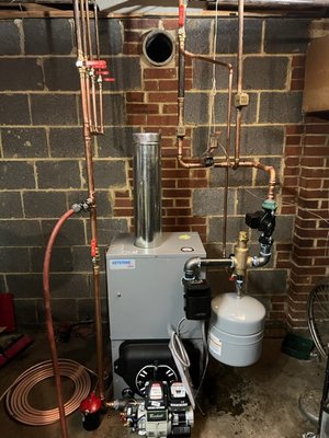 New Boiler Installation - Our team recently completed a new boiler installation for a residential property in Lorton, VA. The project entailed replacing an outdated and inefficient boiler system with a modern, high-efficiency model. Our team conducted a thorough assessment to determine the best boiler type and size to meet the home's heating needs. The installation process included removing the old boiler, updating the necessary plumbing and electrical connections, and ensuring proper ventilation. The new boiler provides reliable, efficient heating, significantly improving the home's energy performance and comfort. This project underscores our commitment to delivering top-quality solutions tailored to our clients' needs. New Boiler Installation - Our team recently completed a new boiler installation for a residential property in Lorton, VA. The project entailed replacing an outdated and inefficient boiler system with a modern, high-efficiency model. Our team conducted a thorough assessment to determine the best boiler type and size to meet the home's heating needs. The installation process included removing the old boiler, updating the necessary plumbing and electrical connections, and ensuring proper ventilation. The new boiler provides reliable, efficient heating, significantly improving the home's energy performance and comfort. This project underscores our commitment to delivering top-quality solutions tailored to our clients' needs.