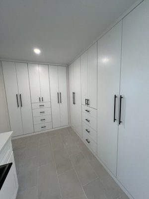 Full closet conversion to custom  cabinetry - This was a full conversion of stadard reach in closets into custom wardrobes