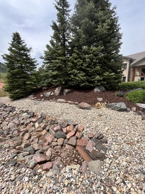 Overgrowth Out, Curb Appeal In: Bush Removal & Rock/Mulch Makeover - Thia project involved removing several overgrown and outdated bushes that had started to take over the space. Once the area was cleared, we designed and shaped a brand-new mulch bed to add structure and enhance the overall aesthetic. To complete the look, we installed decorative rock that not only ties everything together visually but also helps with long-term maintenance and water control.
Projects like this are always rewarding—not just for the curb appeal, but because they help neighbors enjoy and take pride in their outdoor spaces. We’re always grateful to work in the community and help homeowners bring their landscape visions to life. Overgrowth Out, Curb Appeal In: Bush Removal & Rock/Mulch Makeover - Thia project involved removing several overgrown and outdated bushes that had started to take over the space. Once the area was cleared, we designed and shaped a brand-new mulch bed to add structure and enhance the overall aesthetic. To complete the look, we installed decorative rock that not only ties everything together visually but also helps with long-term maintenance and water control.
Projects like this are always rewarding—not just for the curb appeal, but because they help neighbors enjoy and take pride in their outdoor spaces. We’re always grateful to work in the community and help homeowners bring their landscape visions to life.