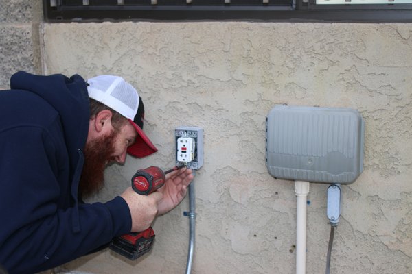 Outlet Replacement - An old outdoor outlet was no longer working, so John replaced it with a brand new outlet.