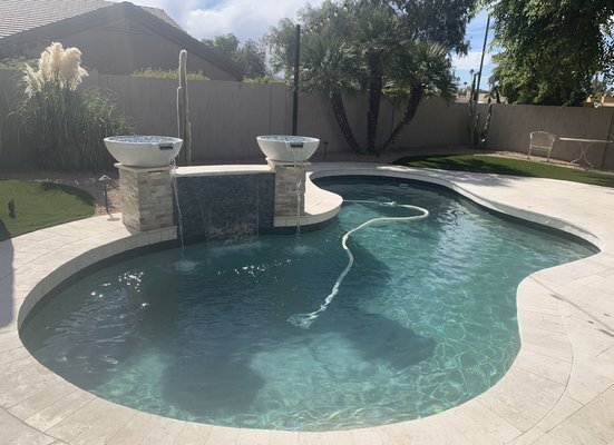 Scottsdale- Backyard remodel - This remodel was done in June 2023. We installed travertine, turf, and the water feature.
