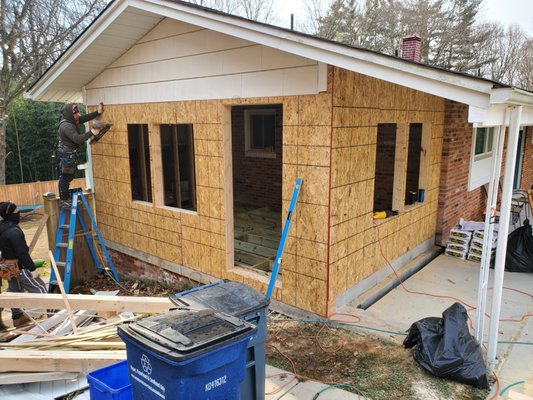 Dining Room Addition - Silver Spring - Turned a carport into an addition. Found the perfect brick to match the facade for a seamless transition.