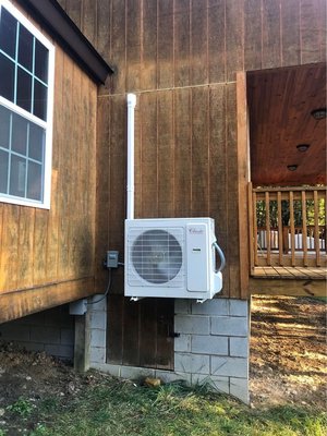 Single Zone 24K Btu Ductless Mini Split - This was a weekend cabin that had no thermostatically controlled heat with only a wood stove. The home owners insurance required a thermostatically controlled heat source. Mini Splits USA inc. Installed this ultra efficient heat and ac ductless mini split and saved the homeowner thousands a year on his home owners Insurance.