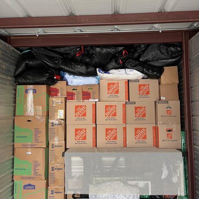 Top-Notch Moving Services - This shows the wrapping of furniture, loading of trucks, house protection, etc., that is standard for our service. Experienced and Caring!