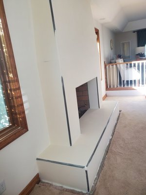 Newly Designed Drywall Fireplace - Homeowner framed the fireplace to their design, I came in to complete and finish the drywall hanging, taping, and Level 5 smooth finish Newly Designed Drywall Fireplace - Homeowner framed the fireplace to their design, I came in to complete and finish the drywall hanging, taping, and Level 5 smooth finish