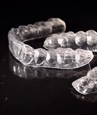 Invisalign Offered! - We offer invisalign - contact us for details!
HOW DOES INVISALIGN TREATMENT WORK?
Invisalign® clear aligners use the most advanced technology to give you your best smile.
SmartTrack material can straighten your teeth with more predictability. Plus, your smile is
shaped more comfortably than with traditional braces.
Invisalign® offers an almost invisible aligning system that straightens teeth fast and
contains no metal.
Invisalign® treatment consists of a series of custom-made aligning trays. The dentist
changes the trays every several weeks to fit the new tooth configuration. In addition to the
reduced visual impact, Invisalign® aligning trays can be temporarily removed for important
occasions – meaning that treatment duration is patient-controlled.
THE TREATMENT
A complete Itero® scan is used to craft a complete digital treatment plan, mapping out your
best smile from beginning to end. The ClinCheck is reviewed and approved by you prior to
treatment.
THE ALIGNERS
Invisalign clear aligners are designed to transform your smile and are made with unique
advances, such as SmartTrack material for comfort and predictability. Each aligner
throughout your treatment gradually and predictably moves your teeth as you continue
with your day-to-day activities. Invisalign Offered! - We offer invisalign - contact us for details!
HOW DOES INVISALIGN TREATMENT WORK?
Invisalign® clear aligners use the most advanced technology to give you your best smile.
SmartTrack material can straighten your teeth with more predictability. Plus, your smile is
shaped more comfortably than with traditional braces.
Invisalign® offers an almost invisible aligning system that straightens teeth fast and
contains no metal.
Invisalign® treatment consists of a series of custom-made aligning trays. The dentist
changes the trays every several weeks to fit the new tooth configuration. In addition to the
reduced visual impact, Invisalign® aligning trays can be temporarily removed for important
occasions – meaning that treatment duration is patient-controlled.
THE TREATMENT
A complete Itero® scan is used to craft a complete digital treatment plan, mapping out your
best smile from beginning to end. The ClinCheck is reviewed and approved by you prior to
treatment.
THE ALIGNERS
Invisalign clear aligners are designed to transform your smile and are made with unique
advances, such as SmartTrack material for comfort and predictability. Each aligner
throughout your treatment gradually and predictably moves your teeth as you continue
with your day-to-day activities.