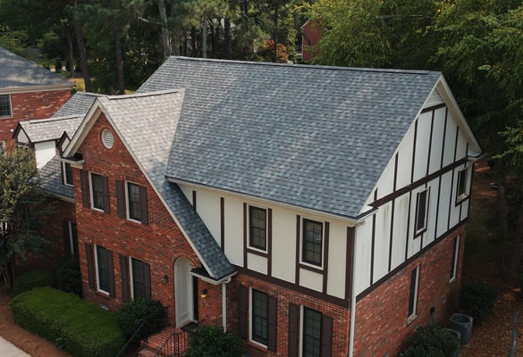 Roof Replacement in Charlotte - This customer wanted to upgrade their old, discolored 3-tab shingles to an architectural shingle with a bold color: Coastal Granite! With a streak-free guarantee, they will enjoy a beautiful roof for many years to come! Roof Replacement in Charlotte - This customer wanted to upgrade their old, discolored 3-tab shingles to an architectural shingle with a bold color: Coastal Granite! With a streak-free guarantee, they will enjoy a beautiful roof for many years to come!