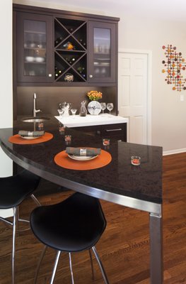 Vadnais Heights Kitchen - This home was newly built, but the kitchen was not conducive for family gatherings. The designer was able to add gathering space with the large island and bar. Quartz countertops were a natural selection for this busy household. No maintenance and carefree for a house filled with teenagers.
Designed by Exquisite Kitchen Design. Vadnais Heights Kitchen - This home was newly built, but the kitchen was not conducive for family gatherings. The designer was able to add gathering space with the large island and bar. Quartz countertops were a natural selection for this busy household. No maintenance and carefree for a house filled with teenagers.
Designed by Exquisite Kitchen Design.