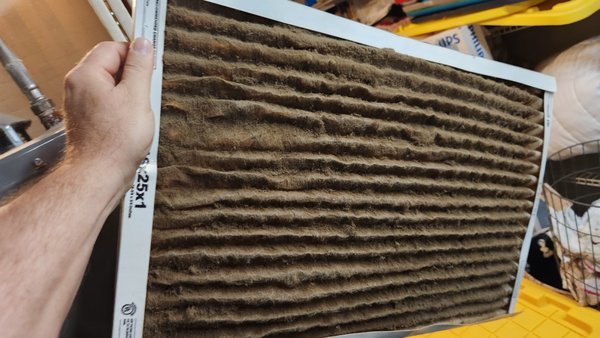 Checking air filters is important - Proper air flow is very important to keep HVAC systems working correctly. As air filters do their very important job and pull dust hair and grim out of the air they natural become clogged up. This is a good thing it is better the filter gets clogged up and not your Furnace or AC coil. As a result of the air filter clogging up it will begin to slow down airflow in the system.
A certain amount of diminished airflow is factored into the system design and the system will still preform within normal operating limits. Once the air filter becomes too clogged up the system performance will diminish. As a result of the diminished performance it will take longer to heat or cool this will increase utility cost and also increases system wear and tear.
When an air filter becomes very dirty (see included picture) it becomes detrimental to system performance and can cause excessive wear and tear. when the system struggles to flow air it can create a cascading effect on the heating and cooling. On the cooling side it can cause your evaporator coil to start to freeze over. Once the coil starts to freeze over it further reduces air flow and so the freezing over of the coil accelerates. For the heating low air flow can cause the heat exchanger to over heat. This overheating will trip a safety feature of the furnace and the furnace will turn off. Some systems will cool off and try to heat again but most will only allow this 3 times before shutting off and entering into an error state. Low air flow will also put extra stress on the blower motor leading to a shorter service life.
Filters need to be checked every month, 1" filters typically need to be replace every month depending on system use. 4"-5" filters can last as long as 3 to 6 months depending on system use. A general rule of thumb is if it look dirty it is dirty. Holding it up to a light can aid in making this determination but typically if a dark layer of film on the filter can be seen it should be replaced. Castle Heating and Cooling recommend the use of pleated style filters. Checking air filters is important - Proper air flow is very important to keep HVAC systems working correctly. As air filters do their very important job and pull dust hair and grim out of the air they natural become clogged up. This is a good thing it is better the filter gets clogged up and not your Furnace or AC coil. As a result of the air filter clogging up it will begin to slow down airflow in the system.
A certain amount of diminished airflow is factored into the system design and the system will still preform within normal operating limits. Once the air filter becomes too clogged up the system performance will diminish. As a result of the diminished performance it will take longer to heat or cool this will increase utility cost and also increases system wear and tear.
When an air filter becomes very dirty (see included picture) it becomes detrimental to system performance and can cause excessive wear and tear. when the system struggles to flow air it can create a cascading effect on the heating and cooling. On the cooling side it can cause your evaporator coil to start to freeze over. Once the coil starts to freeze over it further reduces air flow and so the freezing over of the coil accelerates. For the heating low air flow can cause the heat exchanger to over heat. This overheating will trip a safety feature of the furnace and the furnace will turn off. Some systems will cool off and try to heat again but most will only allow this 3 times before shutting off and entering into an error state. Low air flow will also put extra stress on the blower motor leading to a shorter service life.
Filters need to be checked every month, 1" filters typically need to be replace every month depending on system use. 4"-5" filters can last as long as 3 to 6 months depending on system use. A general rule of thumb is if it look dirty it is dirty. Holding it up to a light can aid in making this determination but typically if a dark layer of film on the filter can be seen it should be replaced. Castle Heating and Cooling recommend the use of pleated style filters.