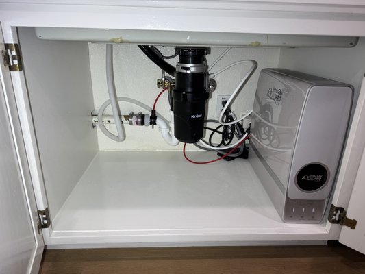 Tankless Reverse Osmosis Drinking Water System - Save space under your sink with our new InterFlo QuadPro SST tankless reverse osmosis (RO) system featuring Superior SmartFlow® Technology. 

- Reduces water waste (Provides 3 glasses of filtered water to every 1 glass of reject water! This is a significant advantage over other systems)
- A sleek, slim system which saves precious under-the-sink space. Its compact design blends seamlessly into any kitchen while maximizing storage capacity (no more bulky tanks)
- Features indicator lights on the faucet as well as the front of the unit signaling the need for cartridge replacement and life.
- Enjoy great quality water longer with 12-month filter and 48-month membrane life based on system use

This advanced system provides about one gallon of filtered water to only two-thirds of a gallon of wastewater, ensuring your family enjoys better water without the waste. Unlike typical point-of-use RO systems, which can produce five gallons or more of reject water for every gallon of filtered water (as noted by EPA.gov), the InterFlo® QuadPro SST delivers efficient, worry-free hydration for your loved ones with every use.