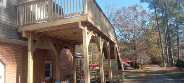 Decks On Decks - Customer wanted an entranceway to the second floor mother in law suite, so we came up with this design, which worked perfectly. The customer was very happy with the outcome.