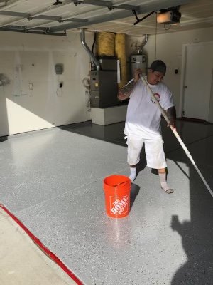 epoxy garage flooring - epoxy paint applied to garage floors. Colors can be any color. Clear coat applied after epoxy to product the epoxy. Can be applied with or without epoxy flakes. epoxy garage flooring - epoxy paint applied to garage floors. Colors can be any color. Clear coat applied after epoxy to product the epoxy. Can be applied with or without epoxy flakes.