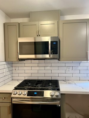 Kitchen and bath improvement/remodel in Shoreline - Client wanted to have her kitchen wall removed to bring in some light and view! Her kitchens island was extended and set with quartz countertop.