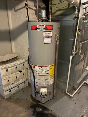 Water Heater Replacement - Installed a new 50 gallon gas water heater and replaced the main water shut off valve in the basement.