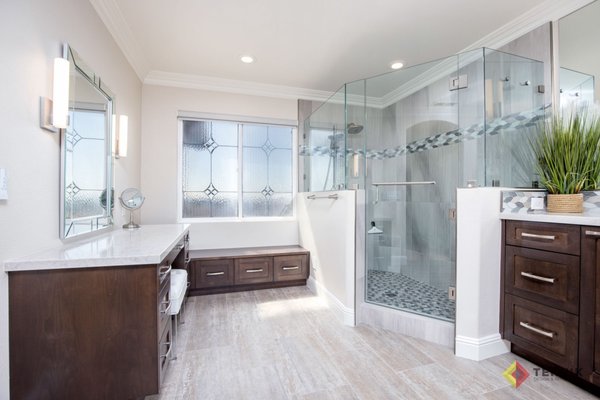 Love Birds Master Bath! - These two love birds are business owners and came to Teknik busier than ever. They have a large bathroom but the old shower was tiny and the bathtub, which they rarely used, was oversized.
Large mirrors, great lighting, an enlarged shower and a hidden shampoo shelf were among their top requests.
We shared our Perfect Remodel Plan (https://teknikinc.com/about/) to show how simple and seamless our bathroom remodel process is. It's as simple as 1-2-3!
We got busy selecting tiles, plumbing & electrical fixtures, vanity stain color, stone countertop colors, and laying out their new room!
When materials arrived, we set a start date, began demo and wrapped up on schedule. The happy couple now enjoy each other AND their bathroom. The bathroom features a triple vanity layout (WOW!) and a massive, gorgeous shower thanks to their impeccable taste. The Perfect Remodel Plan delivered. Thank you M & J! Love Birds Master Bath! - These two love birds are business owners and came to Teknik busier than ever. They have a large bathroom but the old shower was tiny and the bathtub, which they rarely used, was oversized.
Large mirrors, great lighting, an enlarged shower and a hidden shampoo shelf were among their top requests.
We shared our Perfect Remodel Plan (https://teknikinc.com/about/) to show how simple and seamless our bathroom remodel process is. It's as simple as 1-2-3!
We got busy selecting tiles, plumbing & electrical fixtures, vanity stain color, stone countertop colors, and laying out their new room!
When materials arrived, we set a start date, began demo and wrapped up on schedule. The happy couple now enjoy each other AND their bathroom. The bathroom features a triple vanity layout (WOW!) and a massive, gorgeous shower thanks to their impeccable taste. The Perfect Remodel Plan delivered. Thank you M & J!