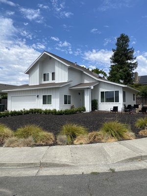 James Hardie Arctic White Board & Batten and Lap Siding - Bay Area - Completed a full exterior siding installation on this two-story Bay Area home featuring James Hardie fiber-cement siding in Arctic White — board-and-batten on the front elevation for that clean modern-farmhouse look, with horizontal lap siding wrapping the rest of the home, including a fully re-sided chimney. Crisp white-on-white trim ties it all together for a bright, timeless exterior with durable, long-lasting protection. Contact Shilo Exteriors Inc. for a free siding estimate.