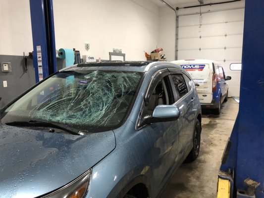 Windshield damaged by ice flying Off a vehicles roof - Damage caused by ice flying off someone’s vehicle. Please take the time to clear your vehicle of all ice and snow. Fortunately no one was hurt but very well could have been. Dont let yourself be the one that hurts someone because of carelessness.