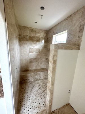 Marble curbless shower and heated floor - Marble tile walk-in shower with electrically heated floors Marble curbless shower and heated floor - Marble tile walk-in shower with electrically heated floors