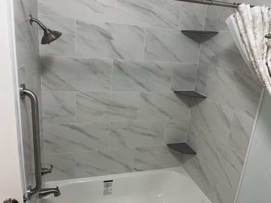 bathroom remodel - customer requested to change a new tub and re-do the tile backwall