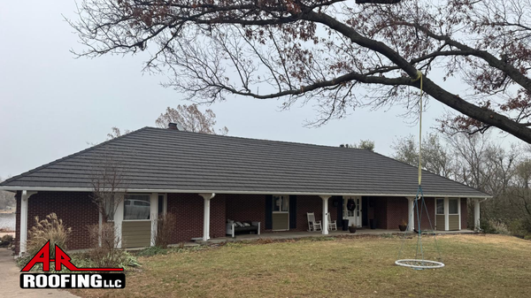 Upgrade to Stone Coated Steel Roof - AFTER PHOTO: This home previously had traditional, light colored, asphalt shingles. Homeowner chose to upgrade to a beautiful and durable stone coated steel roof. This roof will withstand all the elements of Kansas for years to come. Upgrade to Stone Coated Steel Roof - AFTER PHOTO: This home previously had traditional, light colored, asphalt shingles. Homeowner chose to upgrade to a beautiful and durable stone coated steel roof. This roof will withstand all the elements of Kansas for years to come.