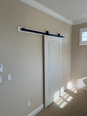 Installation of the barn door - Barn door installation. to the bathroom.