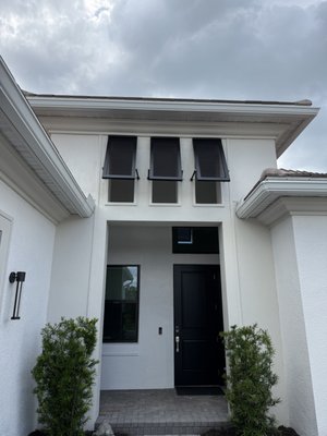 Bahama Shutters - Island style on sunny days. Serious protection when the forecast turns.
Our Bahama Shutters are available in both decorative and impact-rated options, giving your home timeless tropical curb appeal—with the level of protection that’s right for you. Bahama Shutters - Island style on sunny days. Serious protection when the forecast turns.
Our Bahama Shutters are available in both decorative and impact-rated options, giving your home timeless tropical curb appeal—with the level of protection that’s right for you.