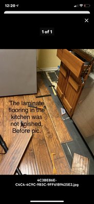 Kitchen floor laminate fix - The flooring was finished. Total cost $250 for the hours took to fix the problem