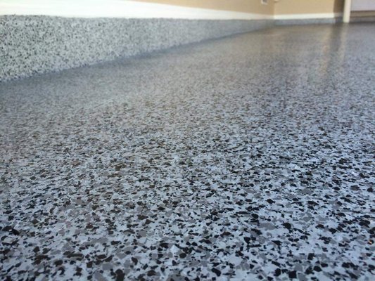 Epoxy Garage Flooring - Lodi Garage Doors and More is your resource for high-quality epoxy floor coatings. We offer a full-line of premium quality, three-part epoxy coating systems designed to be used on concrete flooring. Our flooring is a composition of multi-layer vinyl chips embedded in a pigmented base coat and sealed with successive coats of clear glaze. We offer 12 different styles of heavy granite flooring. Our garage floors are easy to clean and maintain, leaving you free from worry about stains or spills. Epoxy Garage Flooring - Lodi Garage Doors and More is your resource for high-quality epoxy floor coatings. We offer a full-line of premium quality, three-part epoxy coating systems designed to be used on concrete flooring. Our flooring is a composition of multi-layer vinyl chips embedded in a pigmented base coat and sealed with successive coats of clear glaze. We offer 12 different styles of heavy granite flooring. Our garage floors are easy to clean and maintain, leaving you free from worry about stains or spills.