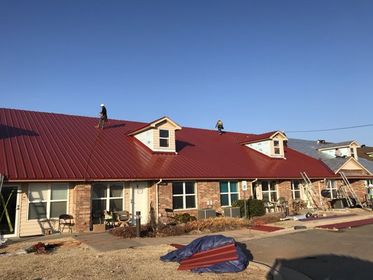Shingle to Metal Living Center - This was a living center for the Shawnee Arapaho Tripe. We took off asphalt shingles and installed a Metal roof for them . Shingle to Metal Living Center - This was a living center for the Shawnee Arapaho Tripe. We took off asphalt shingles and installed a Metal roof for them .