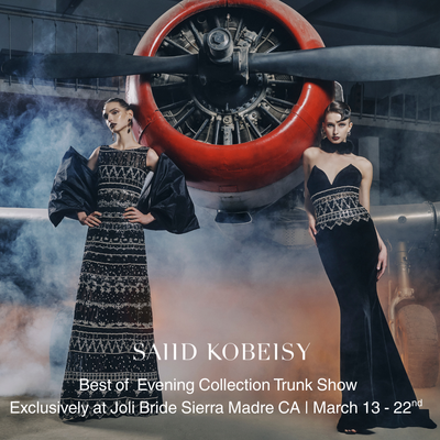 Best of Saiid Kobeisy Evening Collection Trunk Show - Spring 2026 and Fall 2025 a curated collection exclusive to Joli Bride. His collections can be described as modern and feminine, with Middle Eastern Culture and heritage blended with European fashion. Throughout the collection you will see day to night pieces- jumpsuits, jackets, kaftans, cocktail, mid length gowns to formal beaded gowns. The sculpted silhouettes, handcrafted beaded and metallic thread details give you the artistry of couture with the wearable modern glamour. A truly unique and comprehensive collection made for semi formal events like a welcome or rehearsal dinner, to wedding guests, maid of honor and our mothers. Explore the collection and work with your fashion stylists to find the right dress for your next event. Call 626.921.0116 to schedule your one on one appointment. Best of Saiid Kobeisy Evening Collection Trunk Show - Spring 2026 and Fall 2025 a curated collection exclusive to Joli Bride. His collections can be described as modern and feminine, with Middle Eastern Culture and heritage blended with European fashion. Throughout the collection you will see day to night pieces- jumpsuits, jackets, kaftans, cocktail, mid length gowns to formal beaded gowns. The sculpted silhouettes, handcrafted beaded and metallic thread details give you the artistry of couture with the wearable modern glamour. A truly unique and comprehensive collection made for semi formal events like a welcome or rehearsal dinner, to wedding guests, maid of honor and our mothers. Explore the collection and work with your fashion stylists to find the right dress for your next event. Call 626.921.0116 to schedule your one on one appointment.