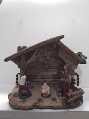 Celtic Navity - Celebrate the Christmas Season with this Navity Scene highlighting a Celtic Cross above the baby Jesus.