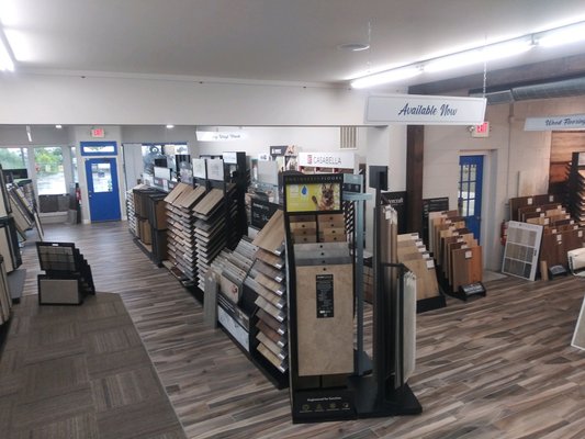 Inside the Store - Planning to visit our flooring store? Have a look inside the showroom before you come. There are options, options, options for flooring of all kinds: hardwood, vinyl plank, vinyl tile, laminate, tile, and carpet. We have knowledgable, no pressure staff that will help you pick the right floor for your home. No sales tactics used here, just flooring expertise. Inside the Store - Planning to visit our flooring store? Have a look inside the showroom before you come. There are options, options, options for flooring of all kinds: hardwood, vinyl plank, vinyl tile, laminate, tile, and carpet. We have knowledgable, no pressure staff that will help you pick the right floor for your home. No sales tactics used here, just flooring expertise.