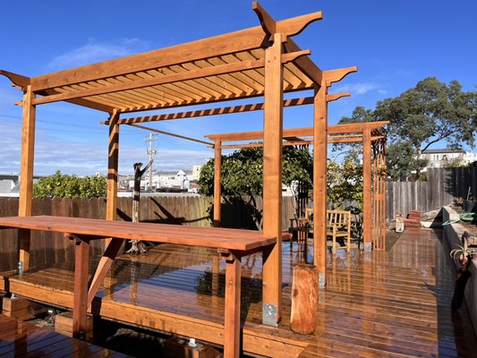 From sandy backyard - to a party ready deck and pergola - It started with an ugly slope of a backyard that was unliveable and messy. We designed the deck, the barbecue zone, trimmed the vines and gave them new trellises base, added a Japanese style pergola - all made of redwood finished with precious oils. From sandy backyard - to a party ready deck and pergola - It started with an ugly slope of a backyard that was unliveable and messy. We designed the deck, the barbecue zone, trimmed the vines and gave them new trellises base, added a Japanese style pergola - all made of redwood finished with precious oils.