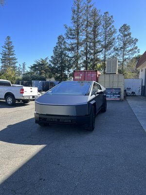 Cybertruck Color Paint Protection Film - Cybertruck in for the Elite treatment. We did a full color paint protection film custom installation on this Cybertruck as the owner wanted to protect it from stains, fingerprints and rusting. We also ceramic coated the entire vehicle and tinted the windows with our Top of the line Ceramic Window Tint. 

Request a Free Quote Today!