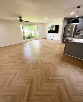 Herringbone Laminate Flooring Installation - We repaired the sub floor in this home, leveled it out, and did herringbone laminate flooring throughout the home Herringbone Laminate Flooring Installation - We repaired the sub floor in this home, leveled it out, and did herringbone laminate flooring throughout the home